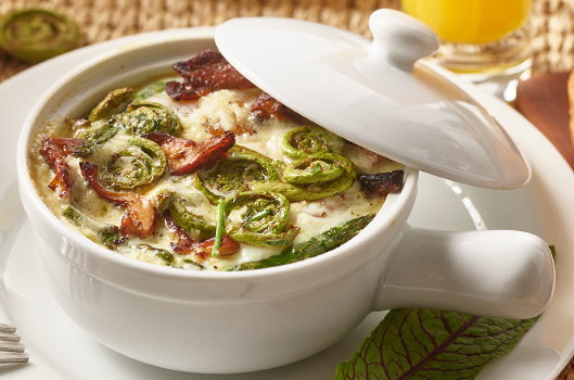 Baked Eggs with Spring Vegetables and Breakfast Sausage