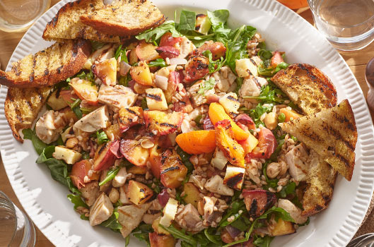 Grilled Heirloom Chicken Breasts with Farro, Roasted Nectarines, and Halloumi “Croutons”
