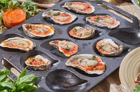 Grilled Oysters with Spicy Tomato Butter