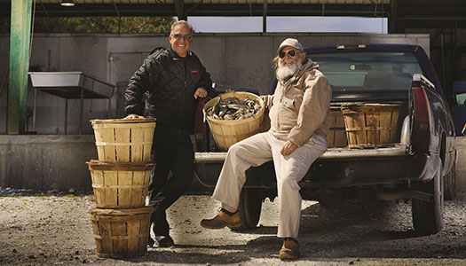 Joe Guerra in pick up truck with baskets of fresh crabs Joe Guerra in pick up truck with baskets of fresh crabs